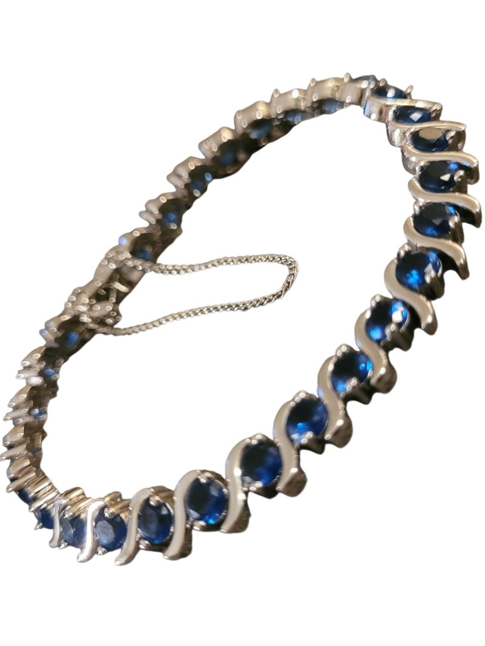 "A Girl's Best Friend" Tennis Bracelet with Deep Blue Gemstones